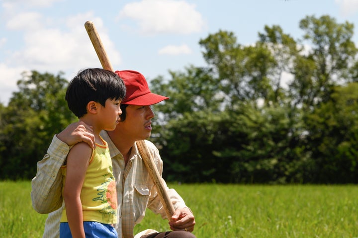 Alan Kim and Steven Yeun in "Minari."