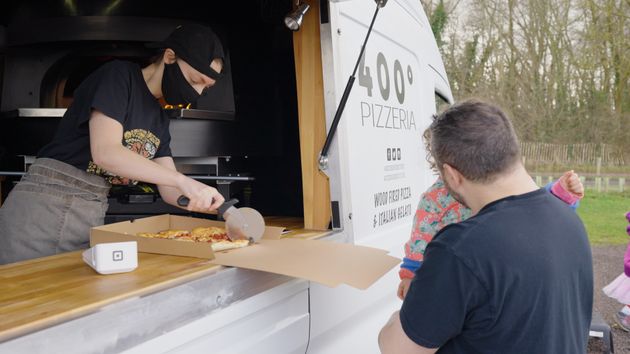 Customers getting takeaway from 400° Pizzeria