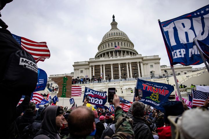 Supporters of Donald Trump storm the U.S. Capitol on Jan. 6 in an attempt to stop the certification of Joe Biden's win in the 2020 presidential election.