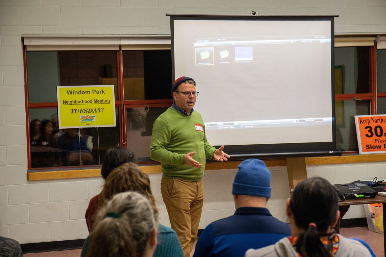 Kim Havey, Minneapolis' municipal sustainability director, voted for the first time in 2019 for the ICC model energy code set to take effect this year. He's seen here speaking about his city's climate goals to a group of residents.