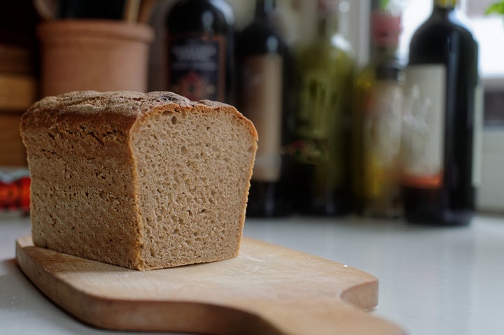 A lot of homemade bread has been on the chopping board.