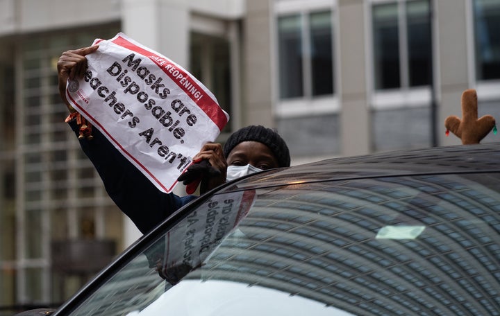 Teachers and supporters participate in a car caravan to demand a safe and equitable return to in-person learning in Chicago on Dec. 12, 2020.