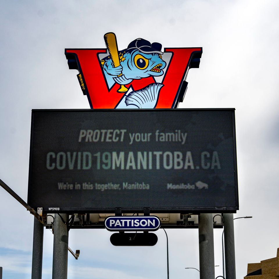 COVDI-19 sign in downtown Winnipeg, Man. on April 21,