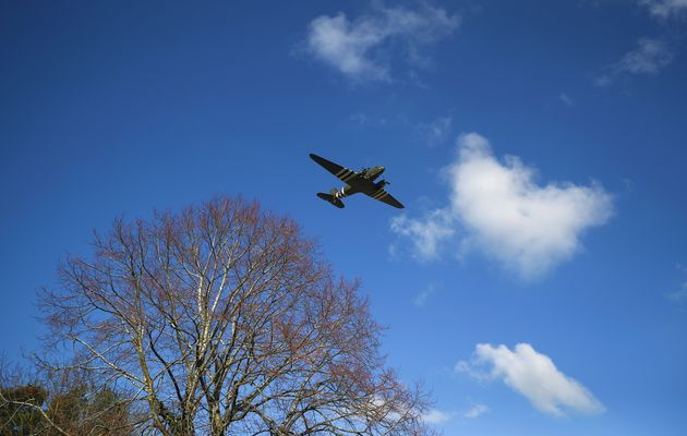The C-47 Dakota, part of the Battle of Britain Memorial Flight which operates from RAF Coningsby in Lincolnshire, flies over the crematorium. 