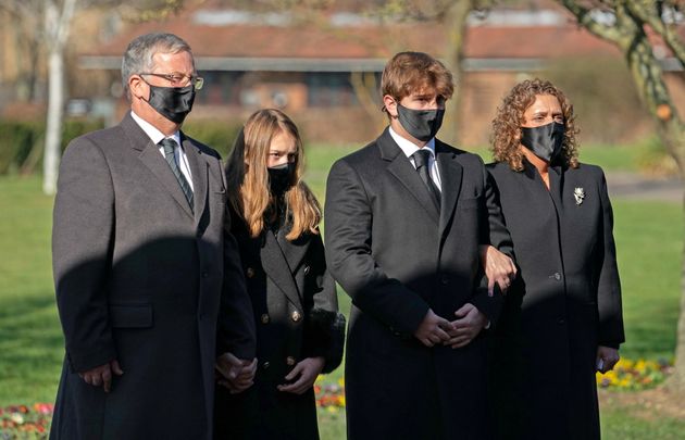 he family of Captain Sir Tom Moore (left to right) son-in-law Colin Ingram, granddaughter Georgia, grandson Benjie and daughter Hannah Ingram-Moore arrive for his funeral at Bedford Crematorium.