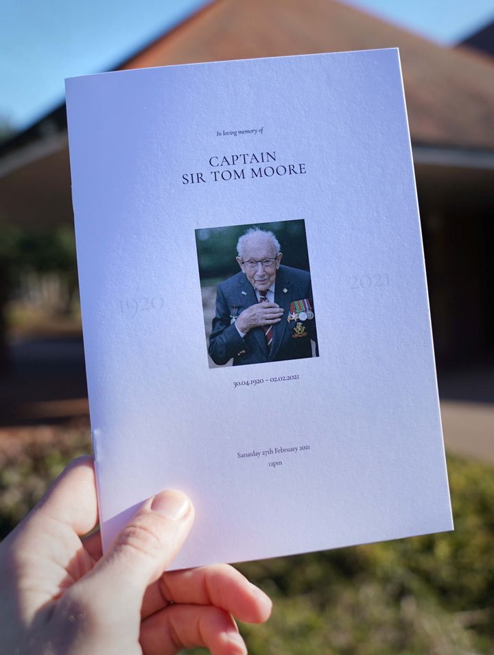 The Order of Service for the funeral of Captain Sir Tom Moore is seen at Bedford Crematorium.