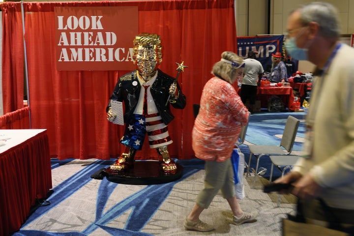 A gold statue of former President Donald Trump is on display at the Conservative Political Action Conference being held in th