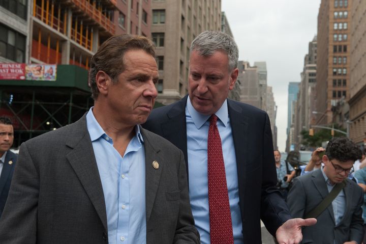 Squabbling at the beginning of the pandemic between Cuomo, left, and New York City Mayor Bill de Blasio, right, resulted in a