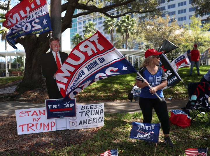 Before he took the stage inside at the Conservative Political Action Conference, supporters of former President Donald Trump stood outside the Hyatt Regency on Sunday.