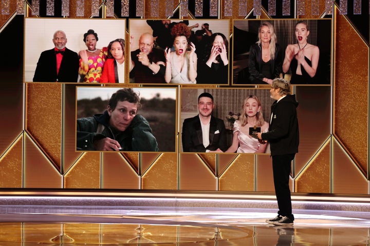 Andra Day (top center) reacts after being named winner of the Best Actress - Motion Picture Drama award for "The United States vs. Billie Holiday."