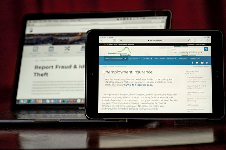 Web pages used to show information for collecting unemployment insurance in Virginia, right, and reporting fraud and identity theft in Pennsylvania, are displayed on the respective state web pages, on Feb. 26, 2021, in Zelienople, Pa. 