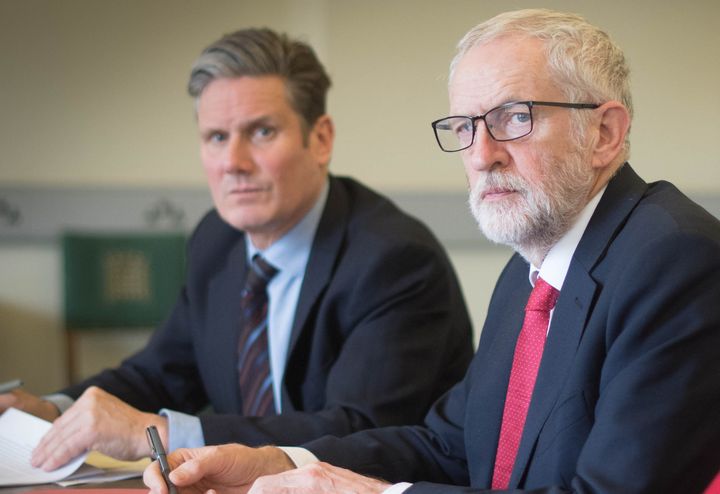 Jeremy Corbyn and Keir Starmer pictured during Corbyn's leadership while preparing for a meeting with Theresa May