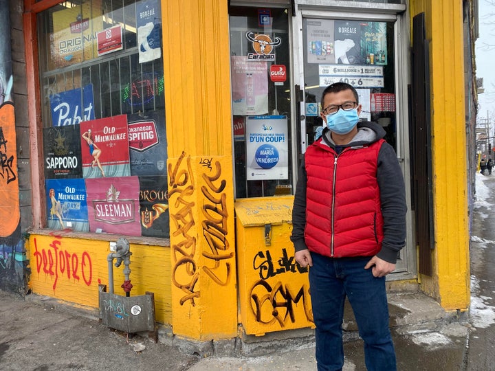 Wenjun Mo outside of his Montreal depanneur.