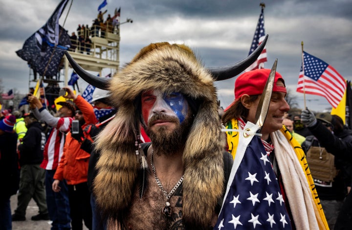 Jacob Anthony Chansley, known as the QAnon Shaman, wore one of the most recognizable costumes at the siege of the Capital -- furs, a horned cap and U.S. flag face paint. He faces several charges stemming from the riot and remains in jail.