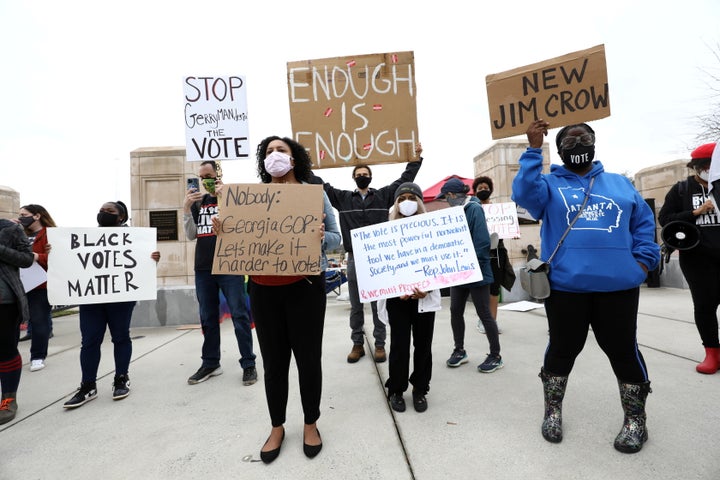 Protesters gather outside the Georgia state Capitol in Atlanta to protest HB 531, which would place tougher restrictions on v