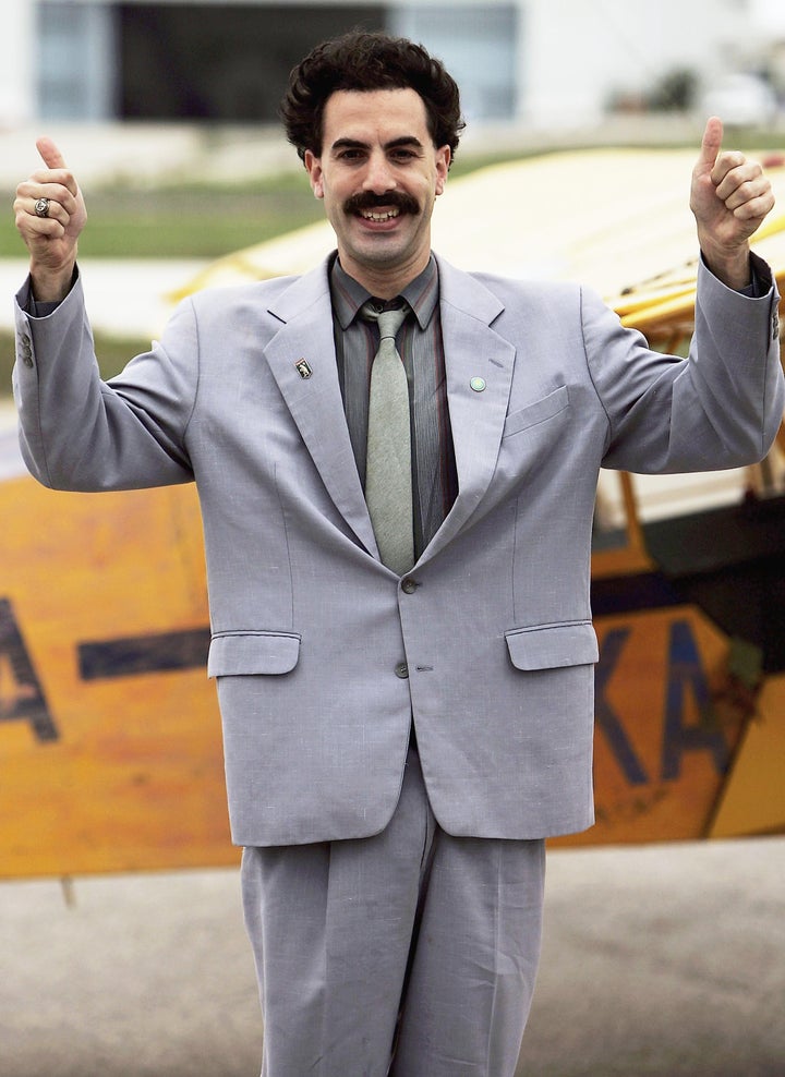 Sacha Baron Cohen playing the part of his comedy character "Borat" lands at a private airfield on November 2, 2005 in Lisbon,