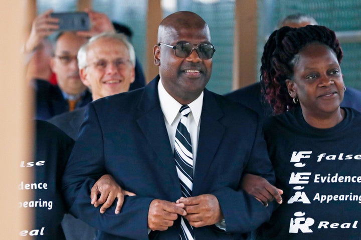 In this Monday, Dec. 16, 2019, file photo, Curtis Flowers, flanked by sister Priscilla Ward, exits the Winston Choctaw Region