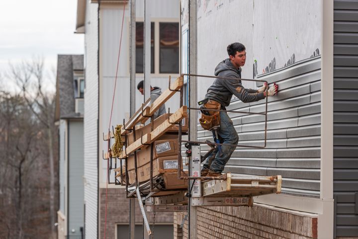 Construction workers in Laurel, Maryland, on Feb. 6, 2020. Buildings use roughly 40% of all energy produced in the U.S. for heating, power and cooking appliances, and generate a proportional share of the country’s planet-heating gases. 