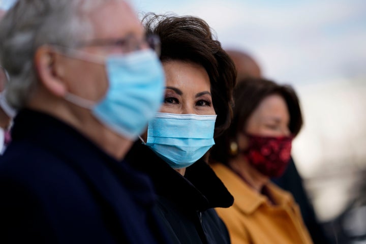 Sen. Mitch McConnell and former Secretary of Transportation Elaine Chao attend the inauguration of President Joe Biden on Jan