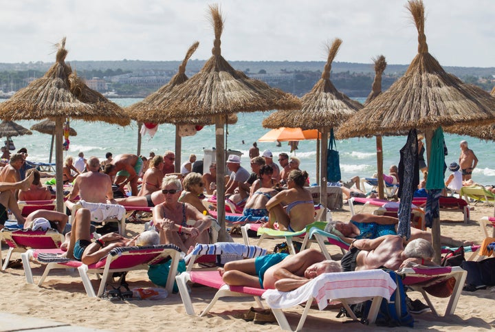 Tourists enjoy a sunny day in Palma de Mallorca in 2019.