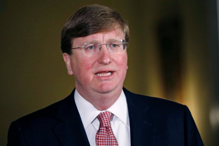 Mississippi Republican Gov. Tate Reeves delivers a televised address prior to signing a bill retiring the last state flag with the Confederate battle emblem during a ceremony at the Governor's Mansion in Jackson, Mississippi, on June 30, 2020. Upon signing the bill, the flag looses its official status. - Lawmakers in Mississippi voted June 28 to remove the Confederate battle standard from the state flag, after nationwide protests drew renewed attention to symbols of the United States' racist past.The measure passed with a 91-23 majority vote in the House of Representatives, triggering cheers in the Senate gallery. A few hours later, the Senate voted 37-14 for the bill. (Photo by Rogelio V. Solis / POOL / AFP) (Photo by ROGELIO V. SOLIS/POOL/AFP via Getty Images)