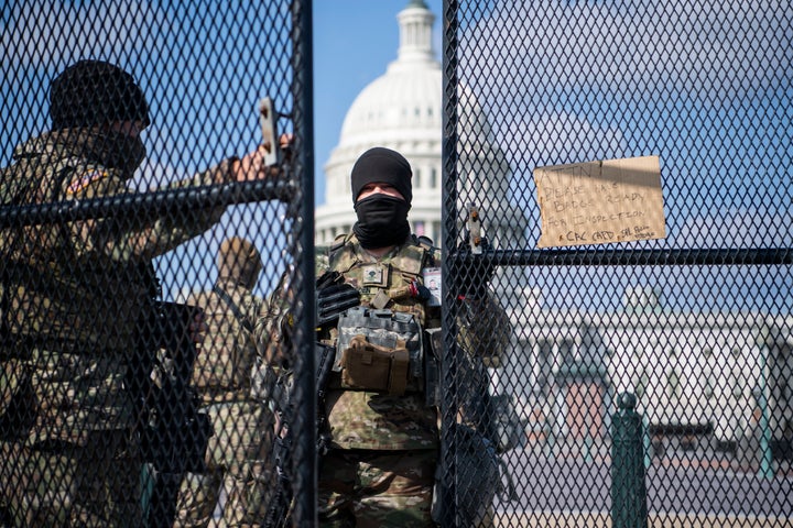 National Guard troops patrol the East Front of the Capitol on March 4, 2021.&nbsp;