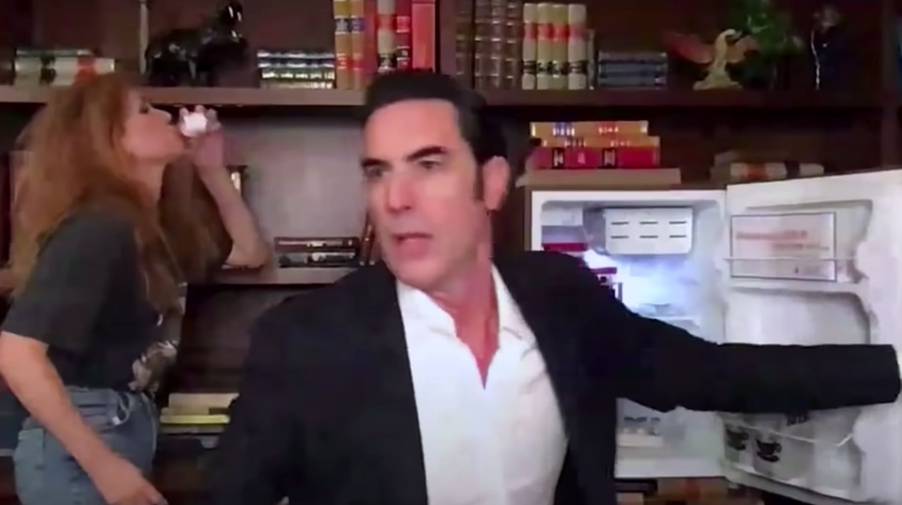 Sacha Baron Cohen Dings Donald Trump Jr., Kanye West In Wild COVID-19 Vaccine-Selling Video