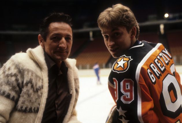 Wayne Gretzky, right, talks to his father, Walter, before the 1984 36th NHL All Star Game on Jan. 31, 1984, in East Rutherford, N.J.