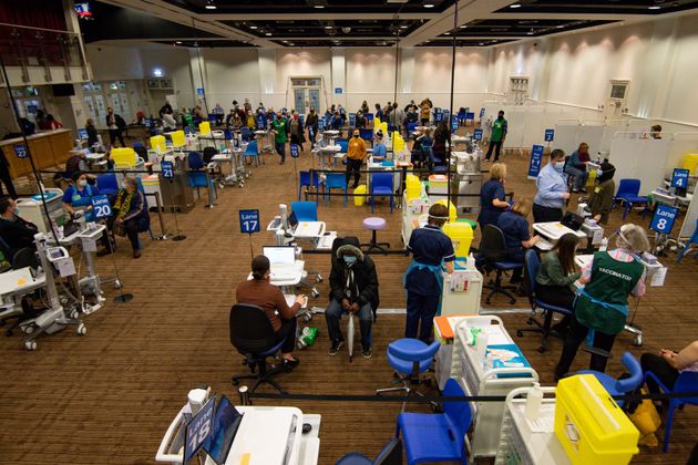 Members of the public receive their vaccinations at the new seven day vaccination centre at Villa Park on February 04, 2021 in Birmingham, England.