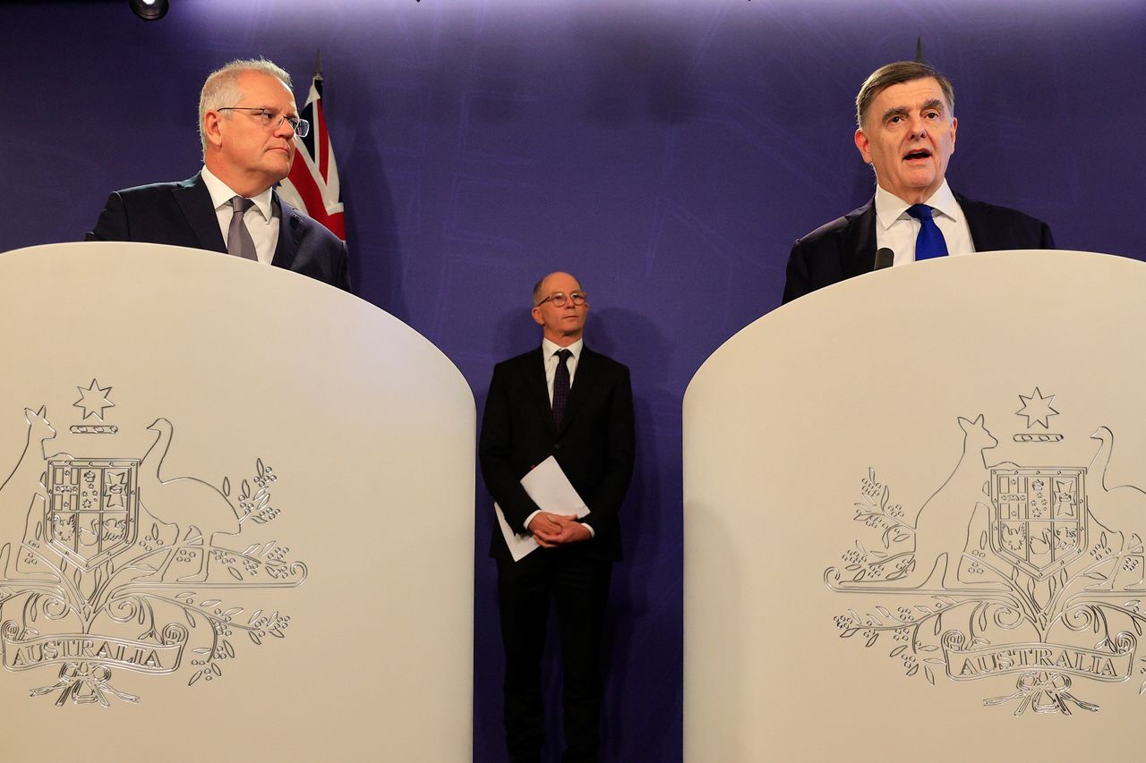Australian prime minister Scott Morrison (left) is joined by Dr Brendan Murphy, secretary of the department of health (right) and professor Paul Kelly, chief medical Officer during a press conference in Sydney, Australia.