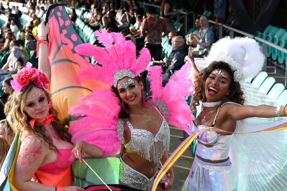 Spectators enjoy the atmosphere from the stands during the 43rd Sydney Gay and Lesbian Mardi Gras Parade at the SCG on March 06, 2021 in Sydney, Australia.