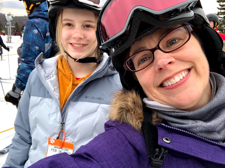 The author and her daughter, Abigail, skiing in February 2020, just weeks before the author became ill with COVID-19.