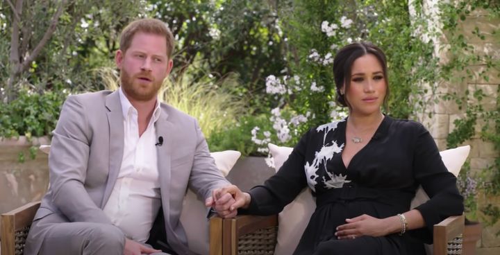 The Duke and Duchess of Sussex pictured in a still from their interview with Oprah Winfrey.