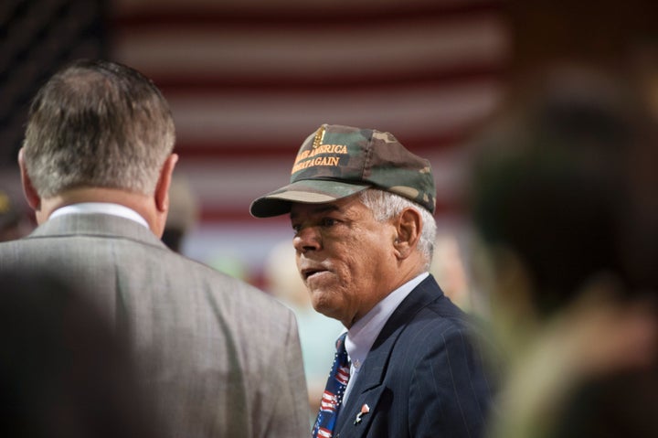 New Hampshire state Rep. Al Baldasaro talks to supporters of Republican presidential nominee Donald Trump before he speaks du