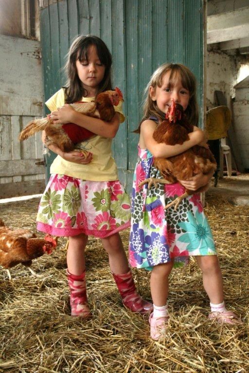 Christen Shepherd's daughters with their rescue hens