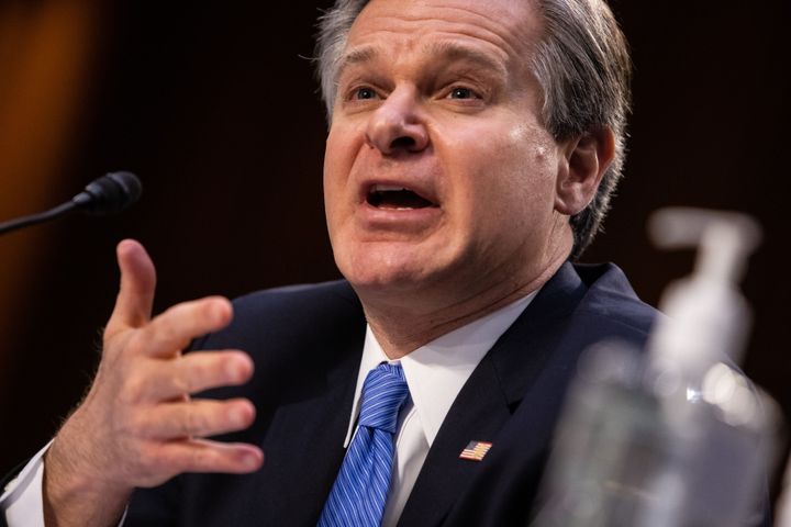 FBI Director Christopher Wray testifies last week before the Senate Judiciary Committee about the Jan. 6 insurrection at the U.S. Capitol.