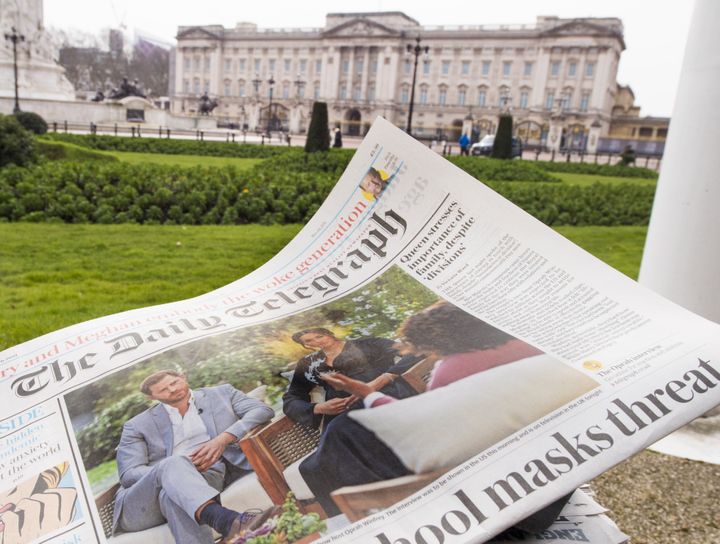 A British newspaper flutters in the wind outside Buckingham Palace in London the day after the Duke and Duchess of Sussex's interview with Oprah Winfrey which is being shown on ITV. Picture date: Monday March 8, 2021. (Photo by Ian West/PA Images via Getty Images)