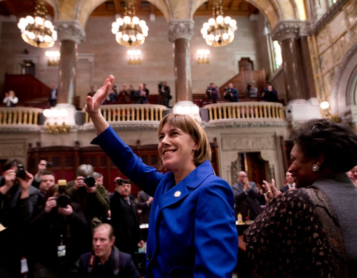 New York state Sen. Cecilia Tkaczyk (D) waves to the gallery after being sworn in to office at the Capitol in Albany on Jan. 23, 2013.