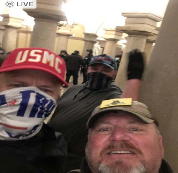 Richard Barnard (left) and Jeffrey Shane Witcher in the Capitol, not the White House, in a screenshot taken from Witcher's cellphone.