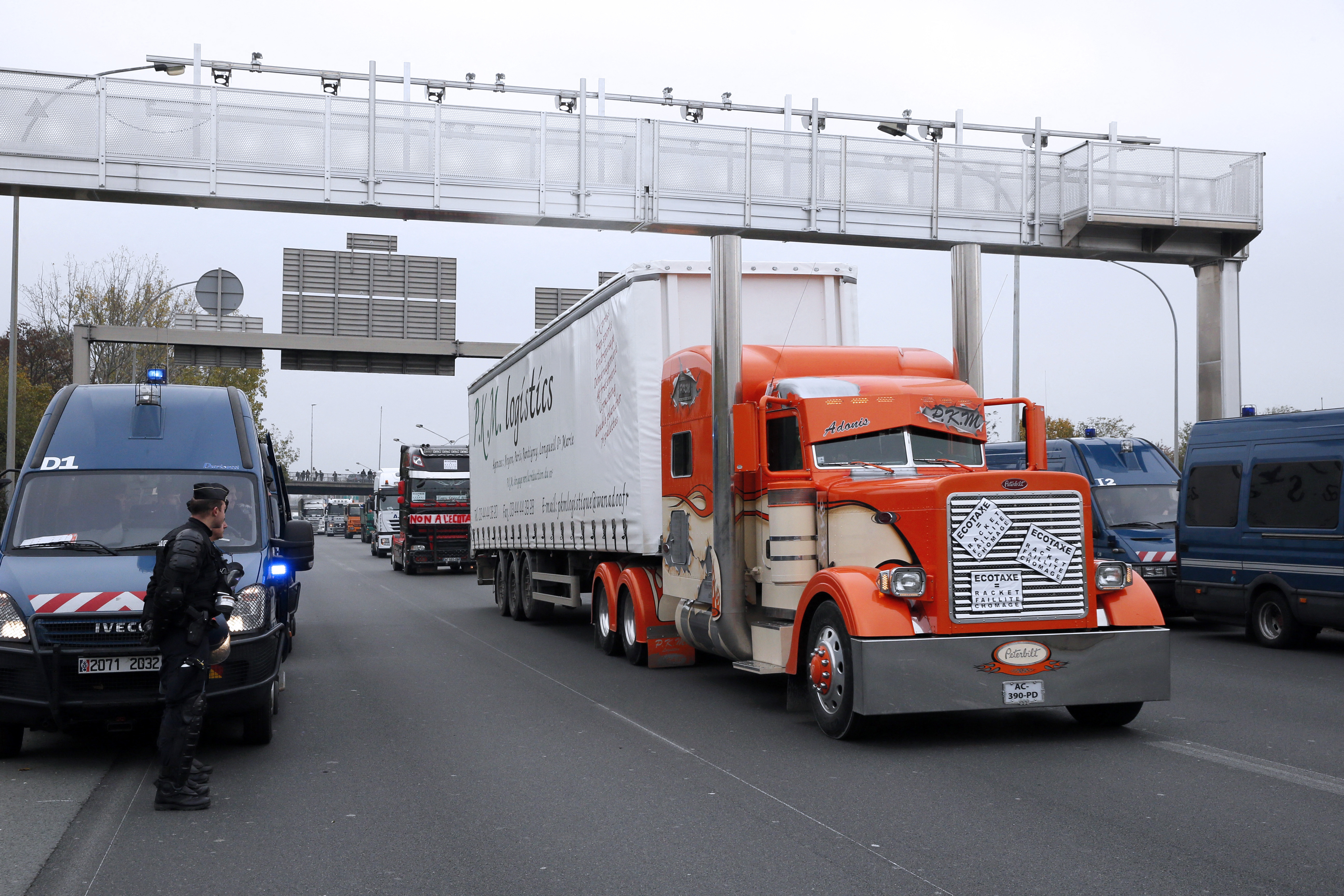 Écotaxe: Les députés donnent leur aval à un retour régional pour les poids lourds