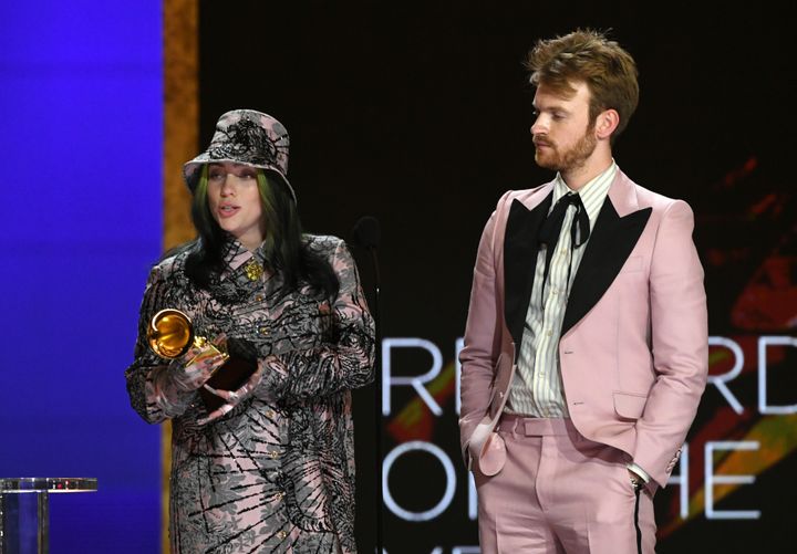 Billie Eilish and Finneas accept the Record of the Year award during the 63rd Annual Grammy Awards.