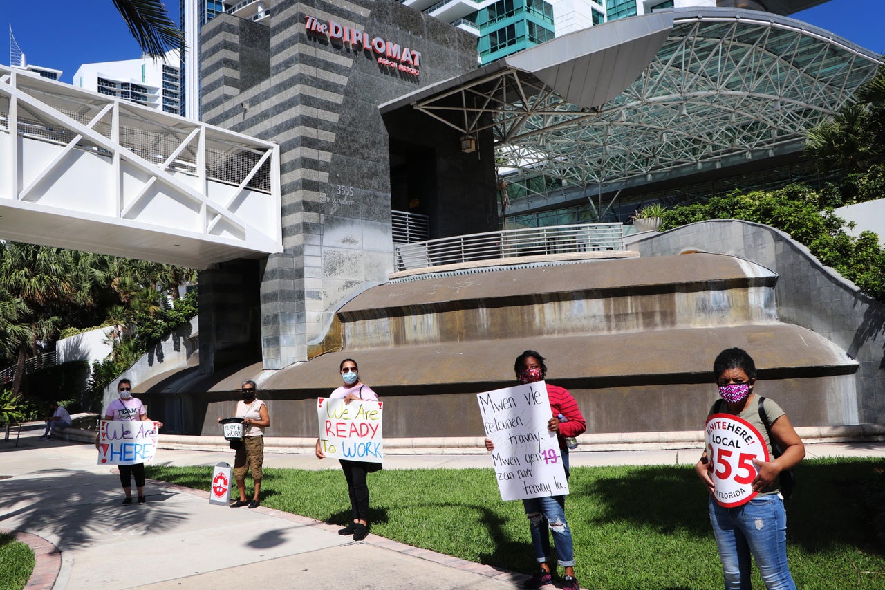 A few of the hundreds of Diplomat hotel staff stage a protest on March 12 to demand their jobs back.