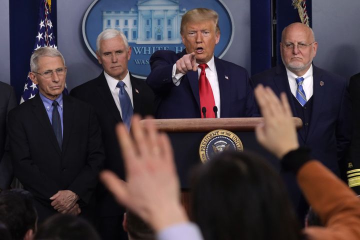 Then-President Donald Trump is seen speaking at a press conference in February 2020. A review of the Centers for Disease Control and Prevention found not all coronavirus guidance issued by the department during the Trump administration was primarily authored by the agency's staff.