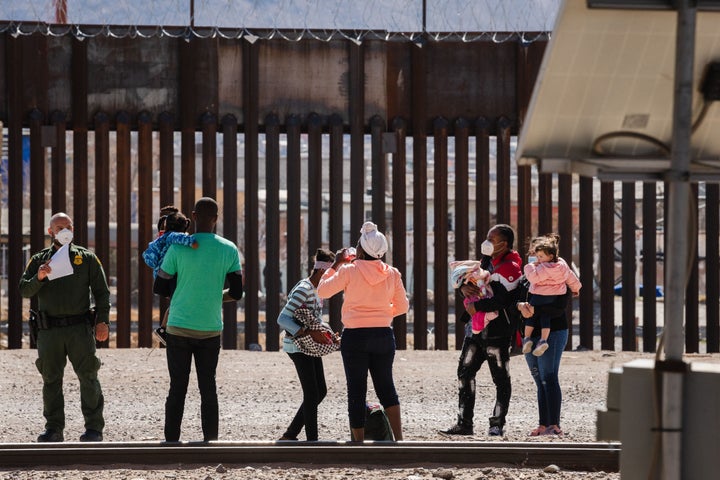 Border Patrol agents apprehend a group of migrants near downtown El Paso, Texas following the congressional border delegation visit on March 15, 2021. - President Joe Biden faced mounting pressure Monday from Republicans over his handling of a surge in migrants -- including thousands of unaccompanied children -- arriving at the US-Mexican border. Republican Congressman Kevin McCarthy of California, who leads his party in the House of Representatives, told reporters last week the "crisis at the border is spiraling out of control.""It's entirely caused by the actions of this administration," said McCarthy. (Photo by Justin Hamel / AFP) (Photo by JUSTIN HAMEL/AFP via Getty Images)