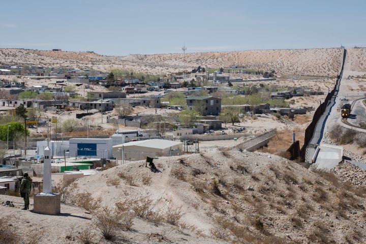 A member of the Mexican Guard stands guard at the border between the United States and Mexico following the House GOP Congressional Delegation to the border Sunland Park, New Mexico on March 15, 2021. - President Joe Biden faced mounting pressure Monday from Republicans over his handling of a surge in migrants -- including thousands of unaccompanied children -- arriving at the US-Mexican border. Republican Congressman Kevin McCarthy of California, who leads his party in the House of Representatives, told reporters last week the "crisis at the border is spiraling out of control.""It's entirely caused by the actions of this administration," said McCarthy. (Photo by Justin Hamel / AFP) (Photo by JUSTIN HAMEL/AFP via Getty Images)