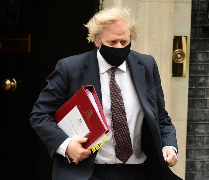 Prime Minister Boris Johnson leaves 10 Downing Street to attend Prime Minister's Questions at the Houses of Parliament, London. Picture date: Wednesday March 17, 2021.