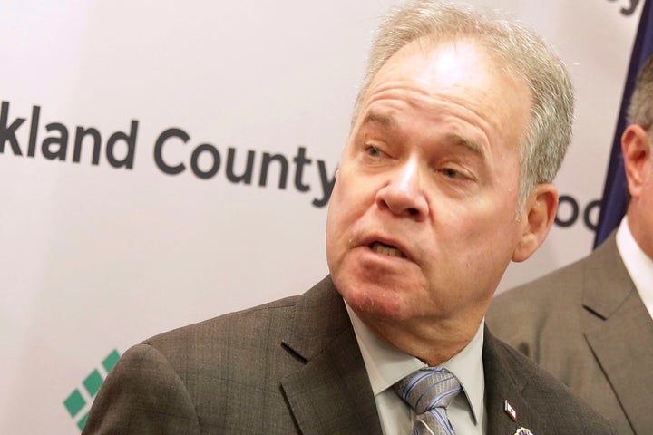 Rockland County Executive Ed Day, second from left, speaks at a news conference in New City, New York, on Dec. 30, 2019.