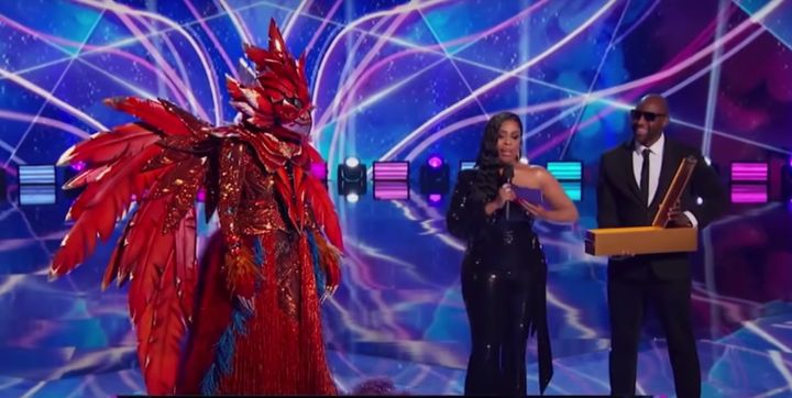 Caitlyn in character as Phoenix on The Masked Singer US