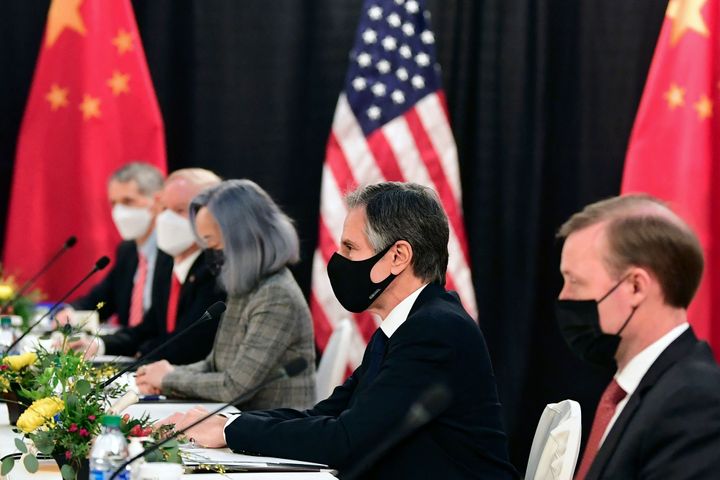 The U.S. delegation led by Secretary of State Antony Blinken (C), flanked by US National Security Advisor Jake Sullivan (R), face their Chinese counterparts at the opening session of US-China talks at the Captain Cook Hotel in Anchorage, Alaska on March 18, 2021.