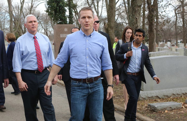 Eric Greitens is seen with then-Vice President Mike Pence in 2017. Greitens resigned as Missouri's governor after 17 months on the job. He's now running for the U.S. Senate. 